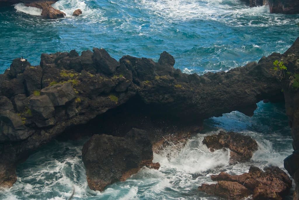 A lava arch at Wai'anapanapa Black sand beach