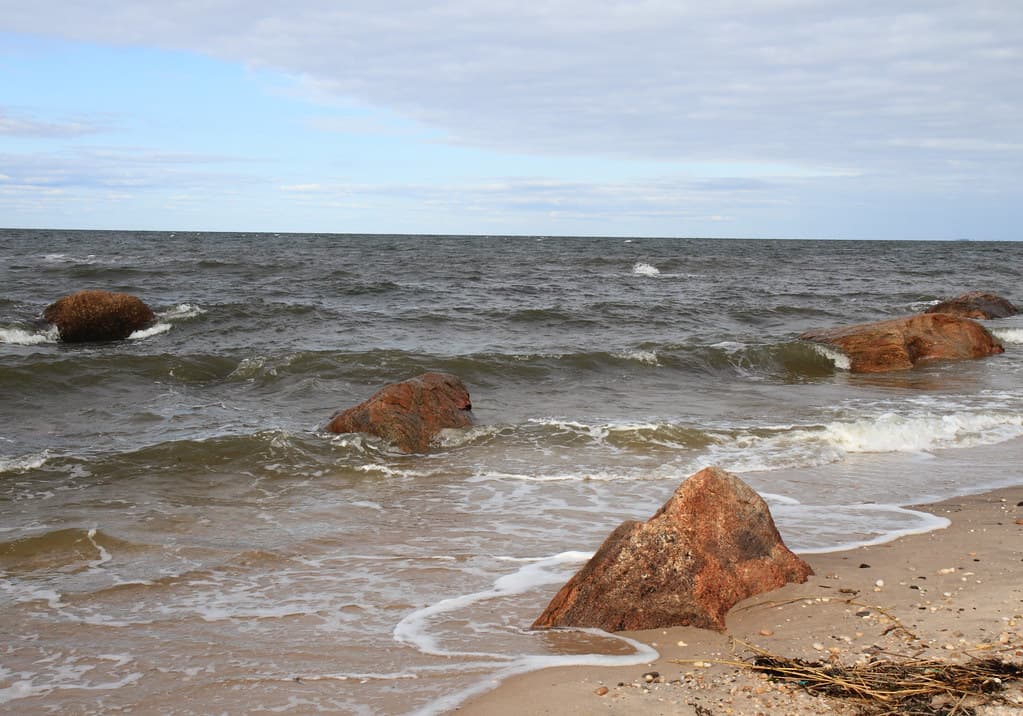 Waves from Long Island Sound Breaking on Glacial Erratics